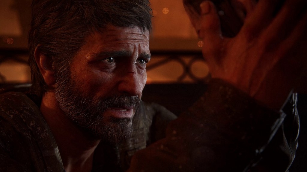 The Last of US: Part 1: Joel holding Ellie's face.