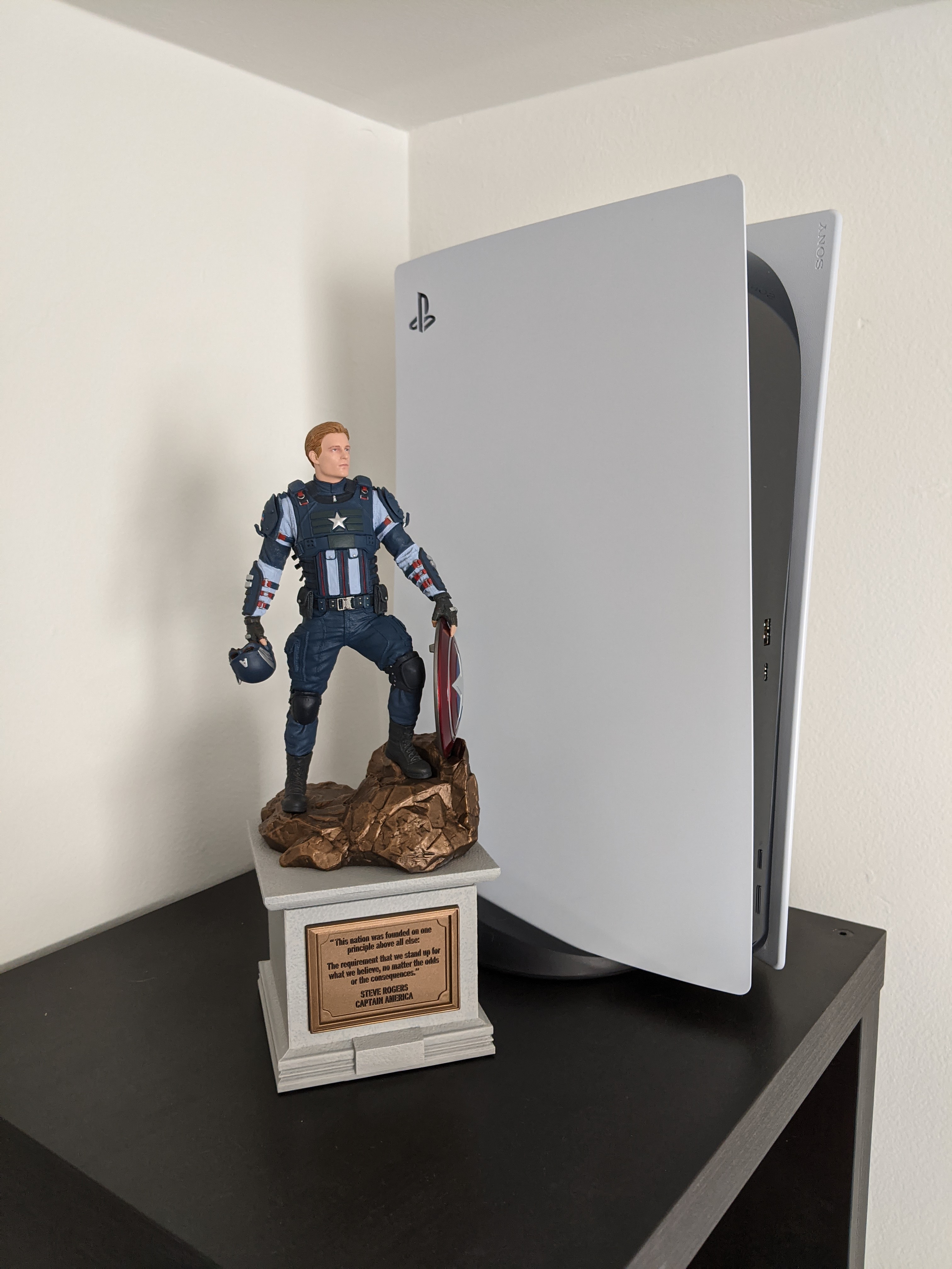 PS5 Next to Captain America Statue
